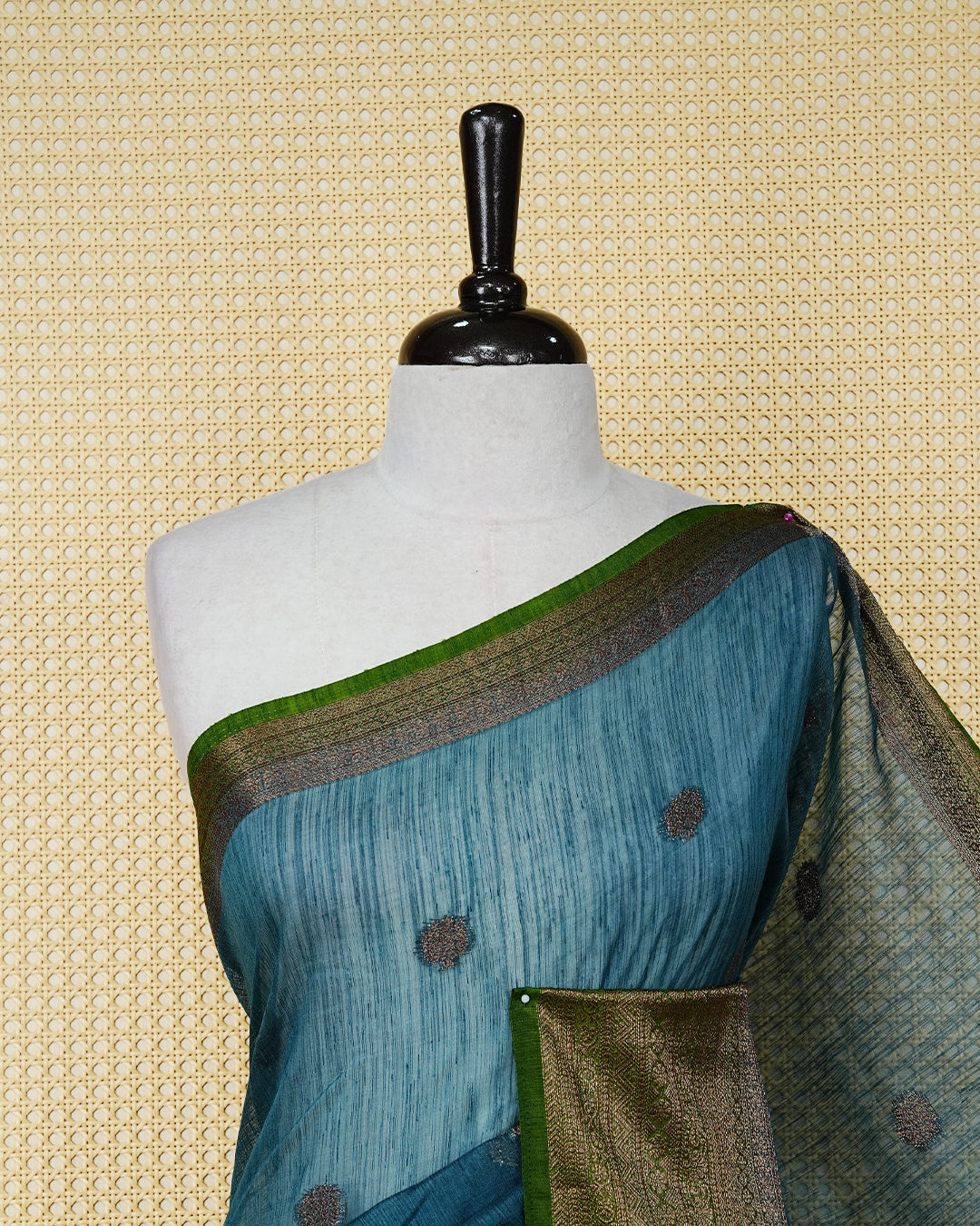 Peacock blue colour semi linen saree thread motifs on body, contrast mehndi green colour gold zari border, rich pallu comes with matching blouse piece