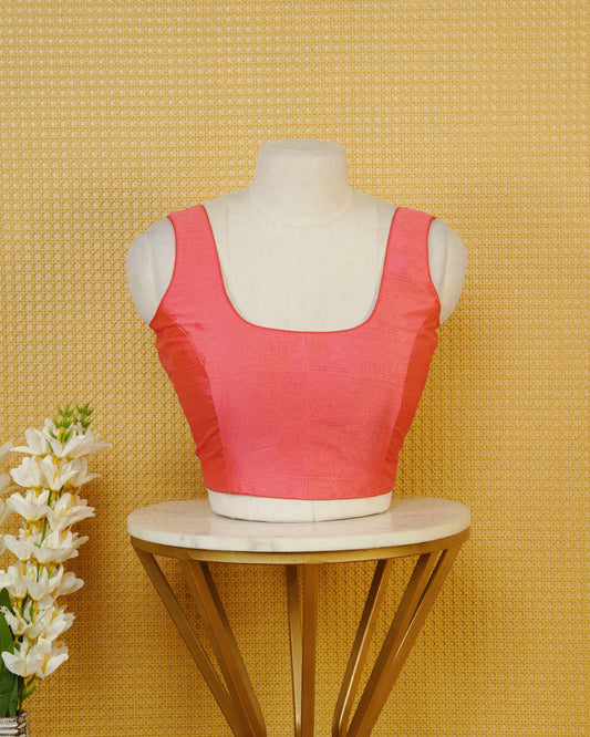 Pink Colour Plain Blouse Featuring A Classic U Neckline, Sleeveless Design, And A Simple, Clean Finish.
