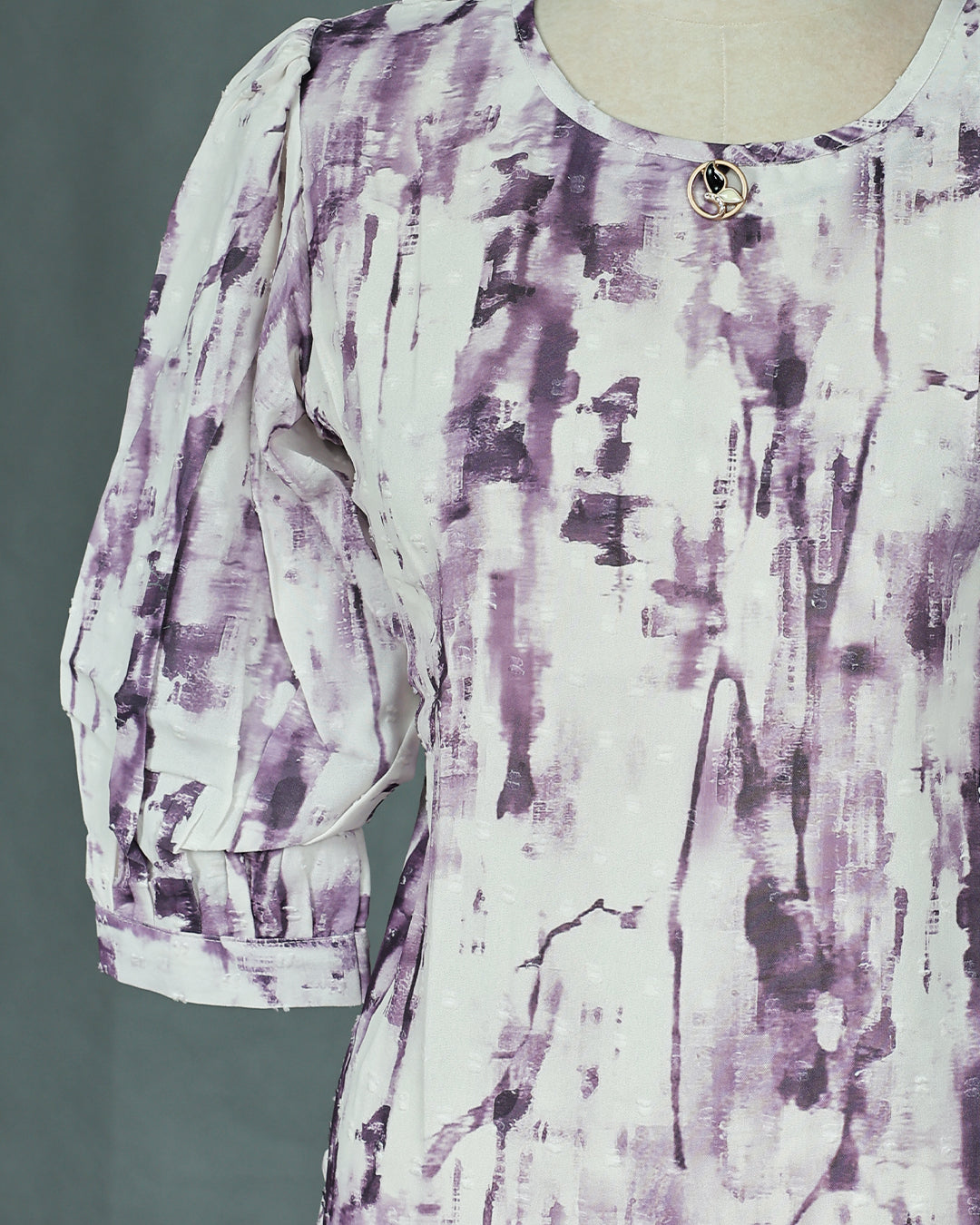 Purple colour Top with Print on body, Round neck design, With sleeve.