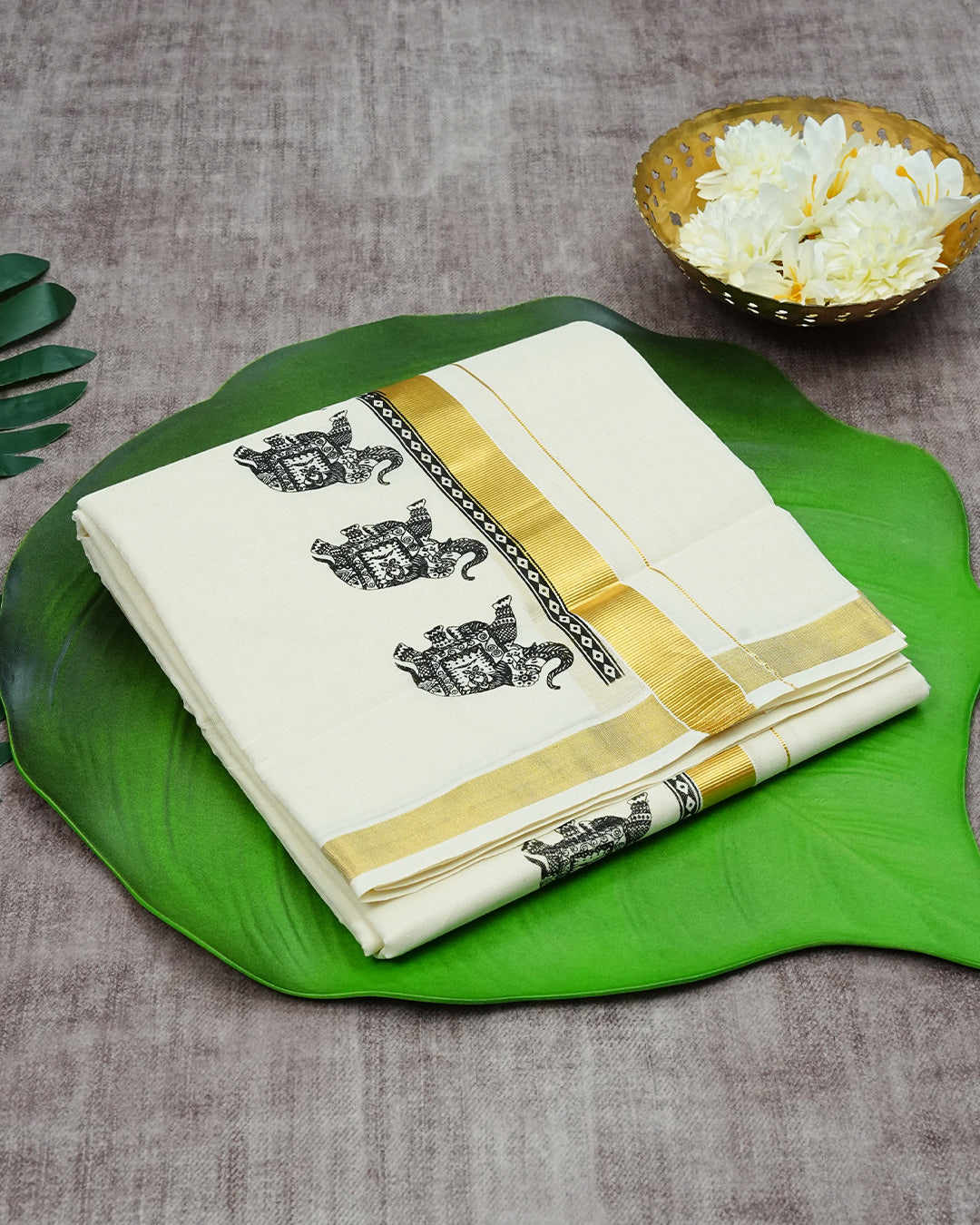 Cream Coloured Cotton Double Dhoti Finished with Black Colour Elephant Printed Gold Kara