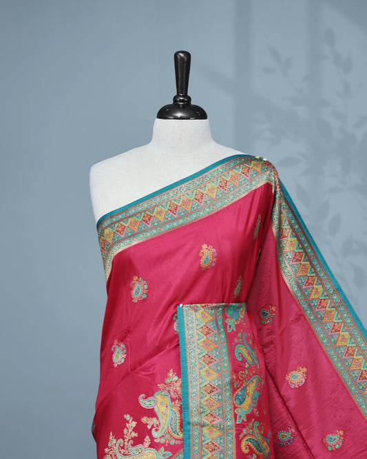 Rani Pink Colour Pashmina Saree featuring Mango motifs on body, complemented by Contrast Teal colour with Floral pattern & gold zari on border and Pallu, comes with matching blouse piece.