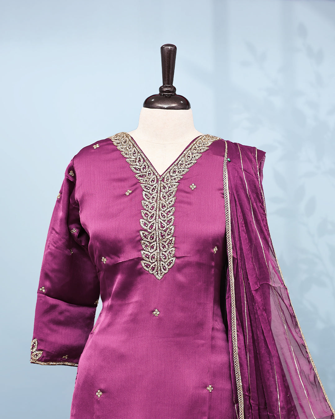 Purple colour Salwar set comes top with Stone work on body, paired with matching bottom and dupatta.