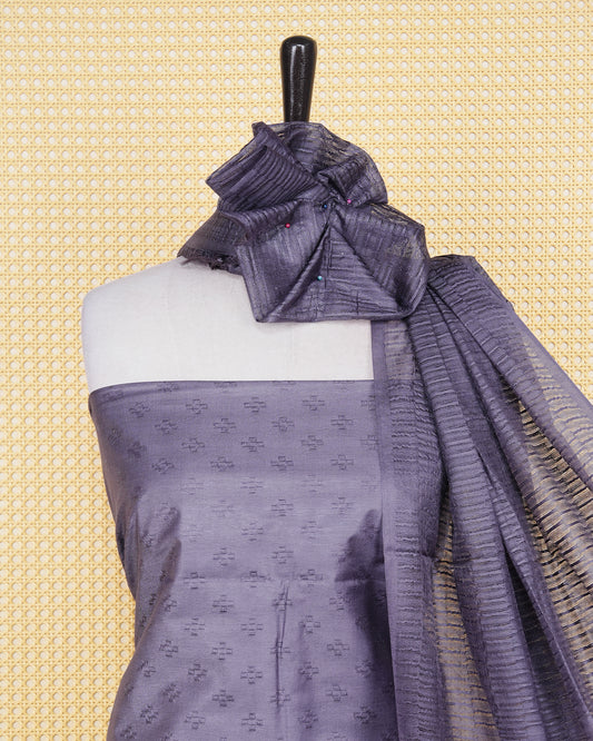 Deep Purple Woven Jacquard Salwar Material Featurs a Subtle Self-Textered Patten Aborned With Shimmering Embossed Geomatric Cross Motifs With Matching Bottom & Elegant Dupatta