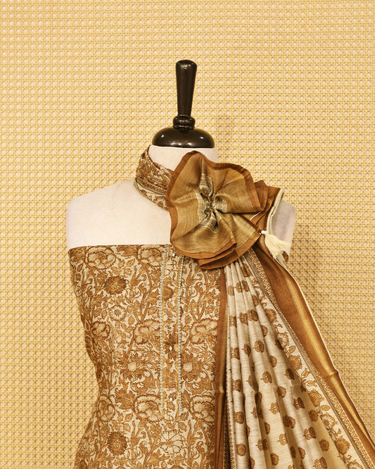 Beige & Antique Gold colour mul chanderi Salwar Material with floral printed kurta, solid bottom, and matching floral printed dupatta.