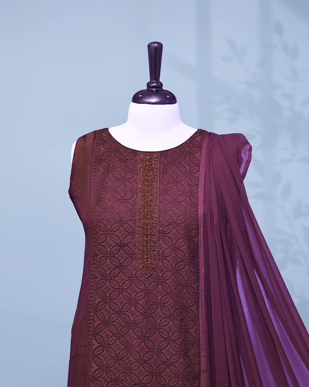 Wine colour Salwar set comes top with thread work on body, paired with matching bottom and dupatta.