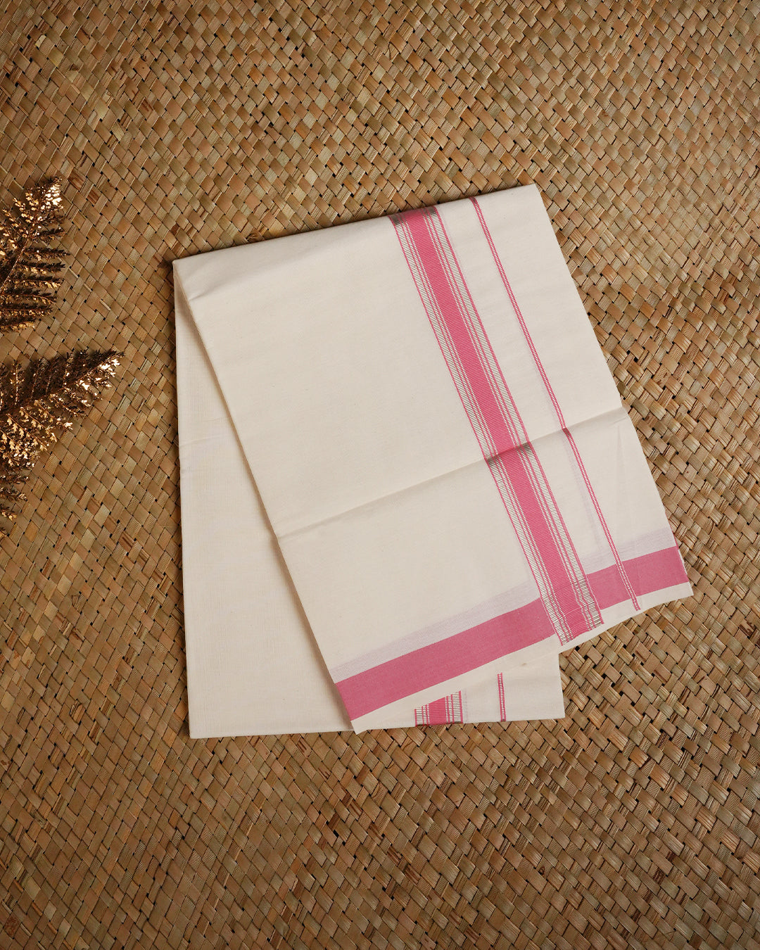 Cream colour cotton single dhoti featuring pink colour with silver zari border.