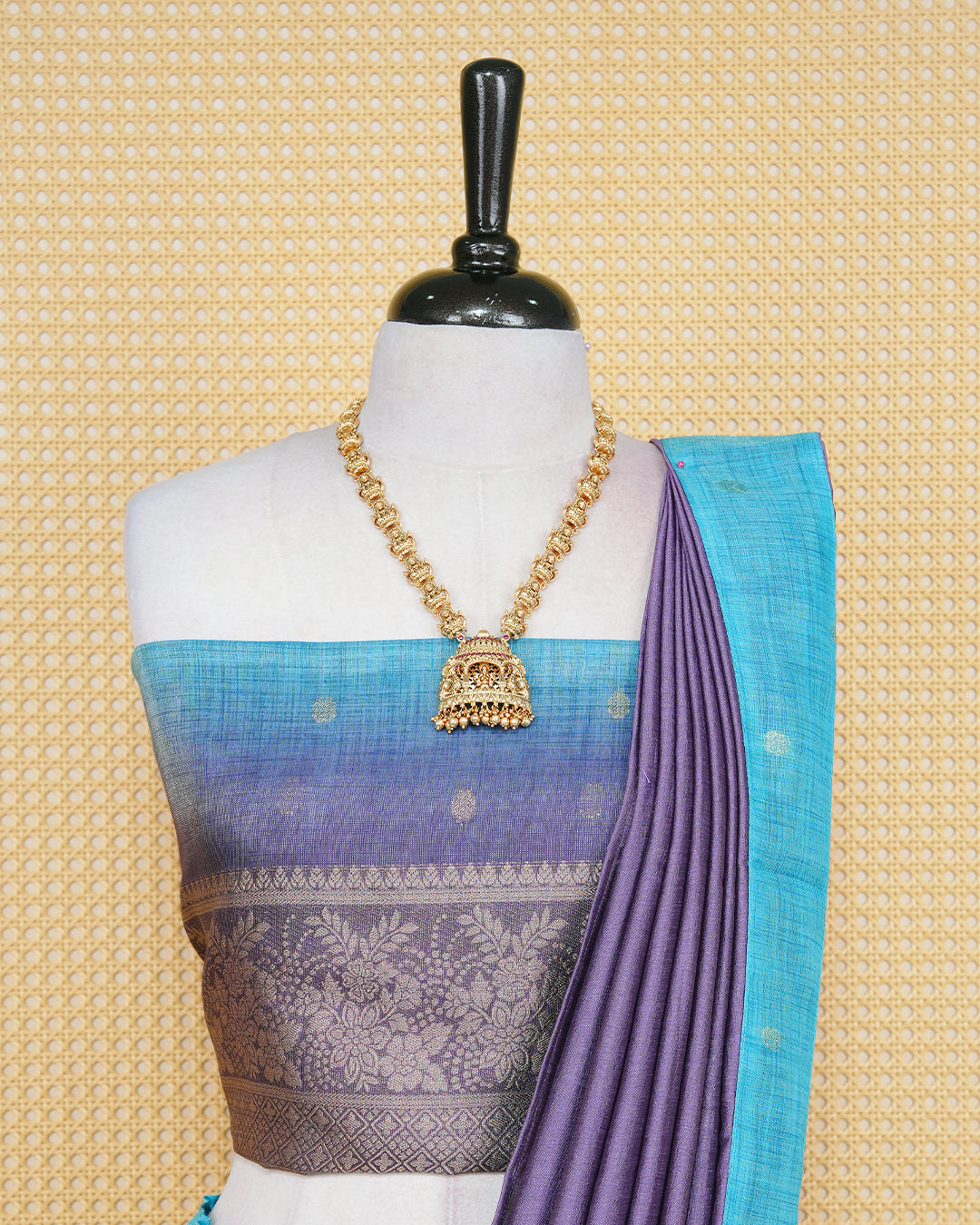 Sky blue & lavender colour Linen Silk Semi stitched dhavani set featuring buttas, zari bordered skirt & blouse piece and dupatta.