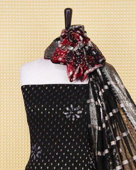 Black & Red Shade Georgette Salwar material Features a Vibrent Tie Dye Pattern Aborned With Shimmering Metallic Gold foil Dots,pired with matching bottom & elegant Duptta