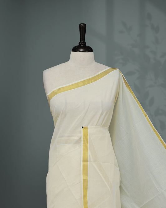 Cream colour Kerala saree Featuring an Elegant plain body, complemented by a classic simple gold zari border, matching blouse piece.