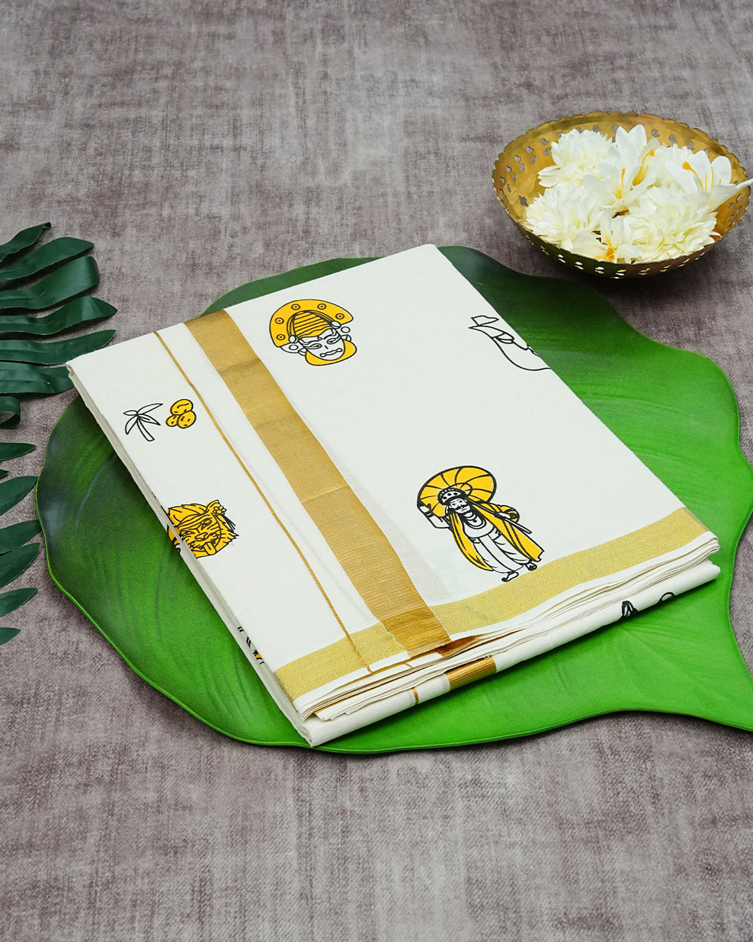 Cream Coloured Cotton Double Dhoti Finished with Onam Themed Prints & Gold Kara