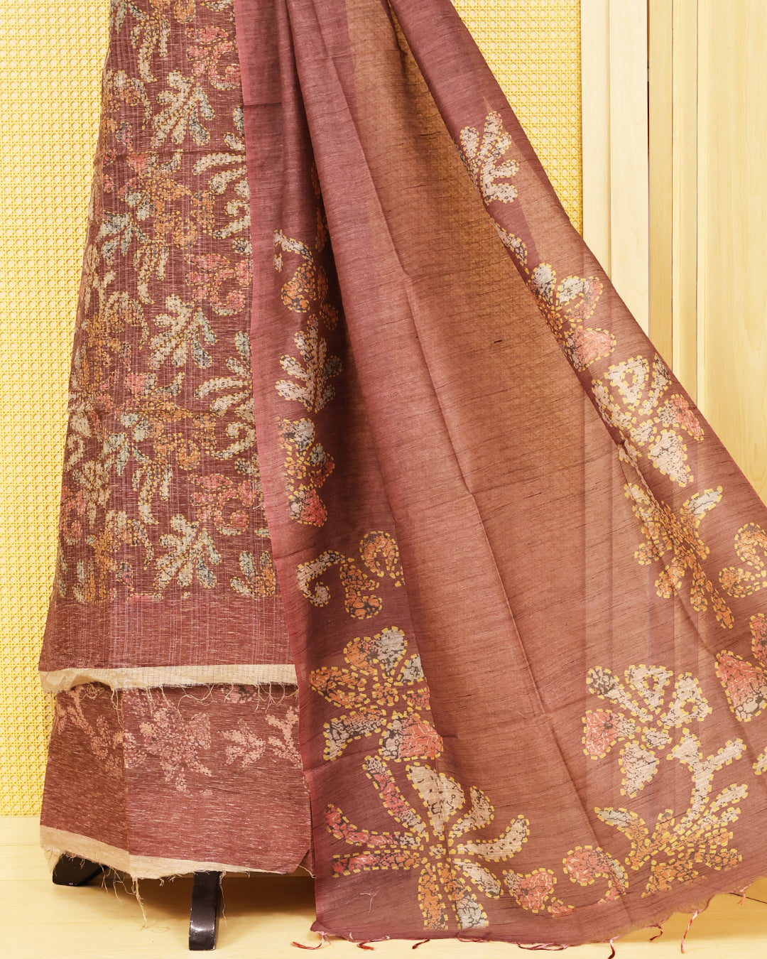 Brown colour organza Salwar Material featuring elegant floral prints on the kurta, paired with a matching bottom and a self coloured printed dupatta.