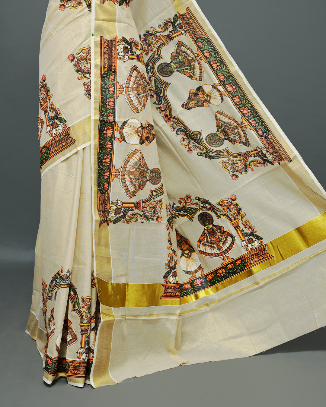 Cream colour Tissue Kerala saree Featuring An Elegant body, complemented by a classic gold zari with Indian Art form print on border, matching blouse piece.