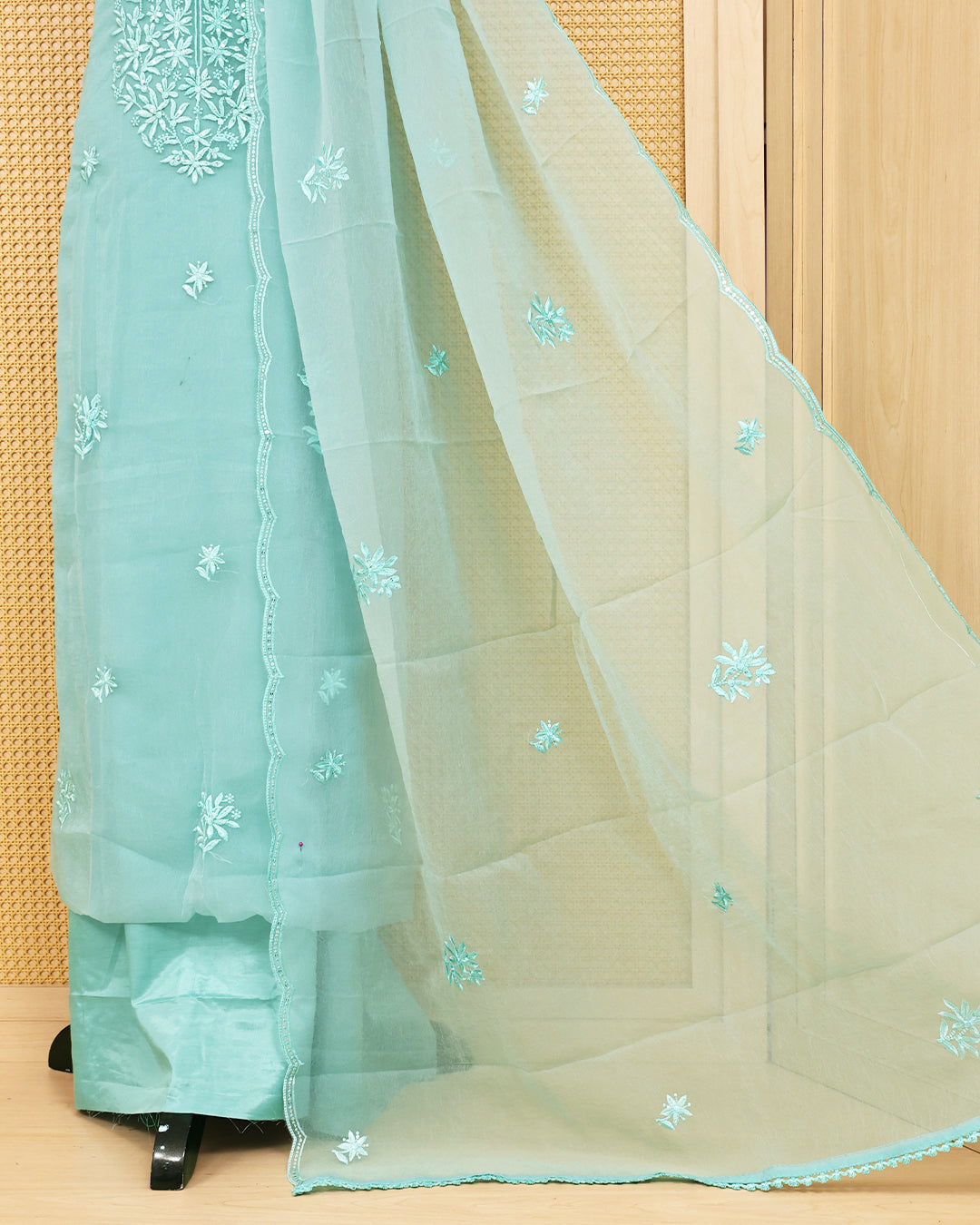 Pastel green colour Crush organza salwar material featuring thread work on body, paired with Matching bottom & dupatta.
