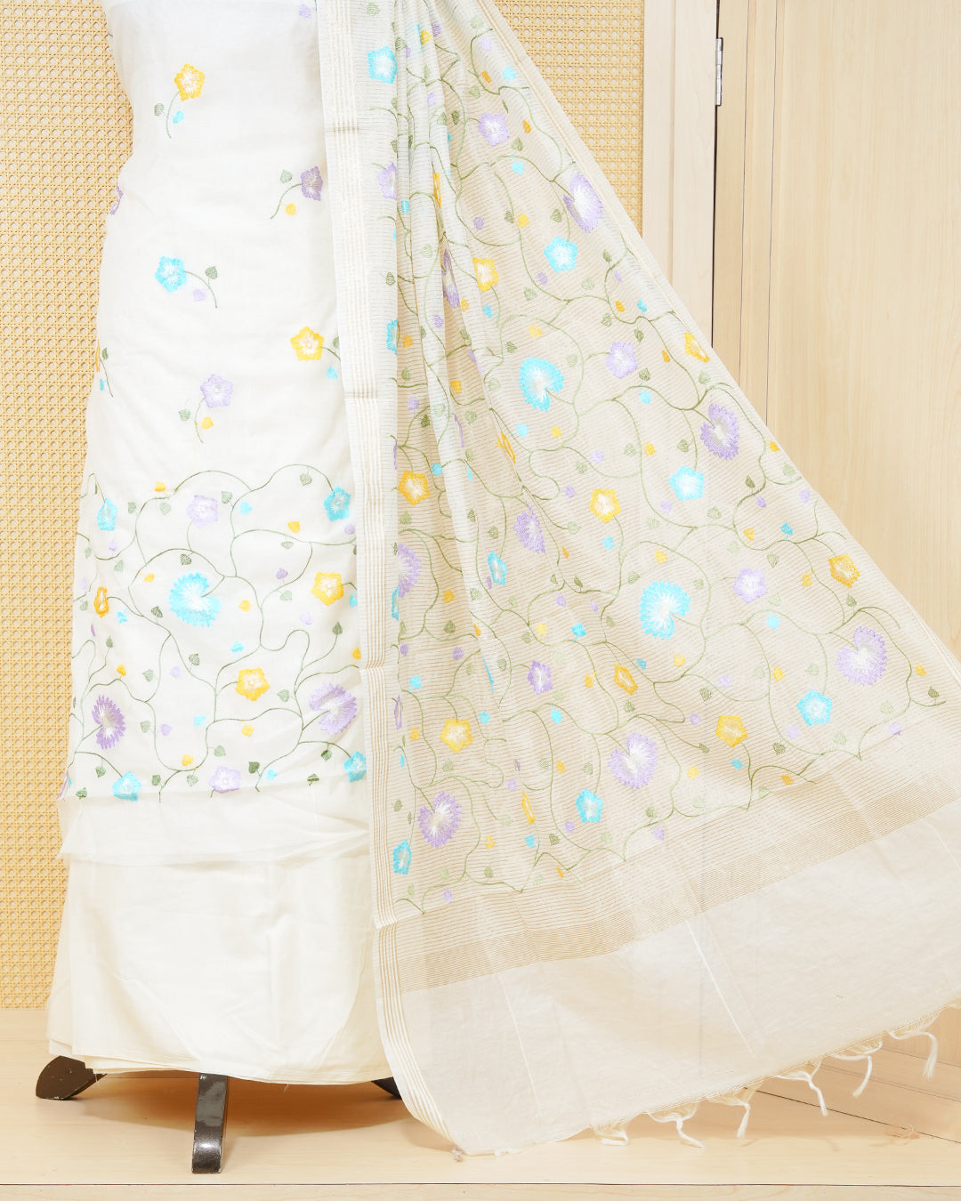 Cream colour tissue salwar material featuring an elegant floral Thread Work on Body , paired with a matching bottom and an elegant dupatta.