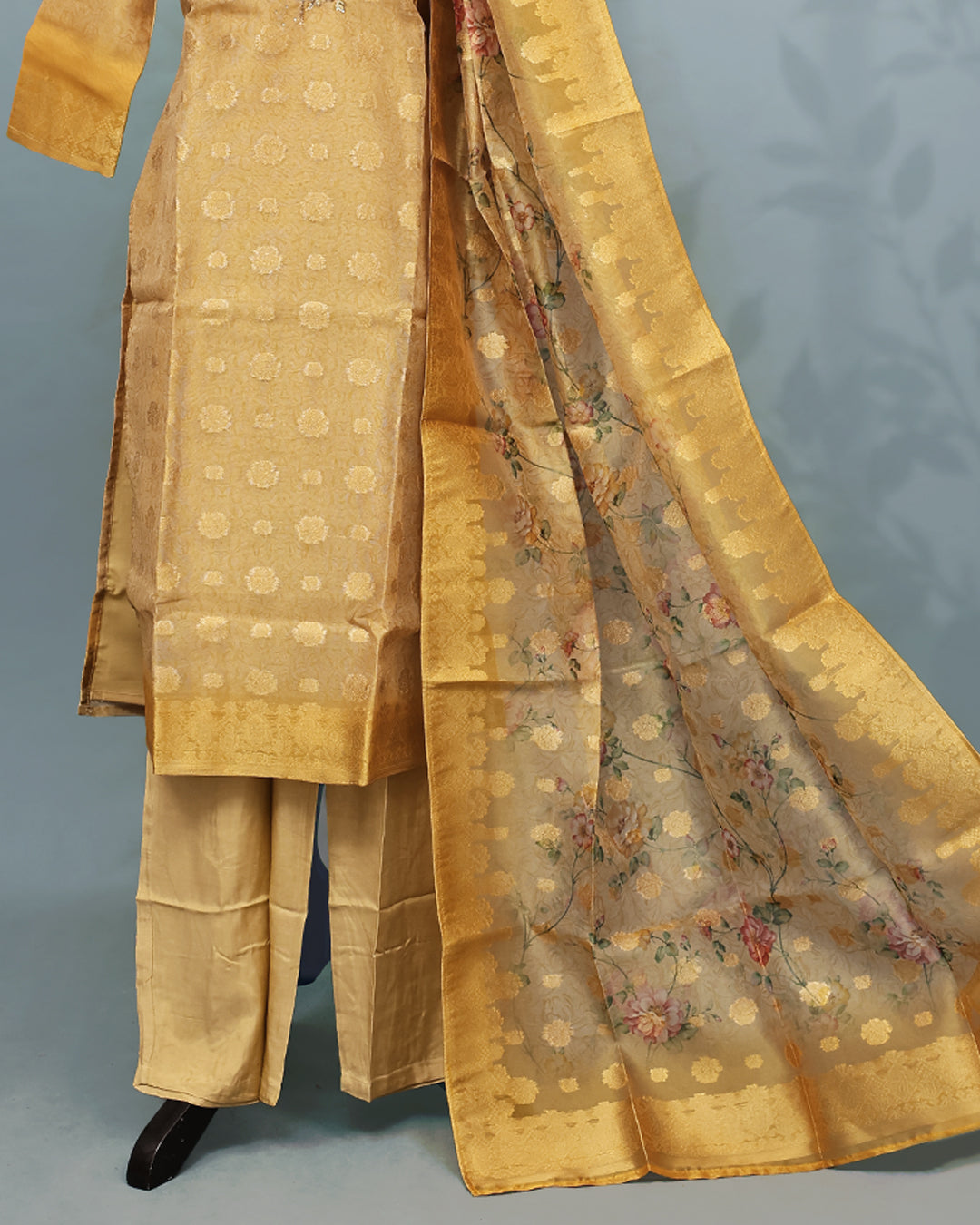 Gold colour Salwar set comes top with Gold zari work with Beats & cutbeats on body, paired with matching bottom and dupatta.