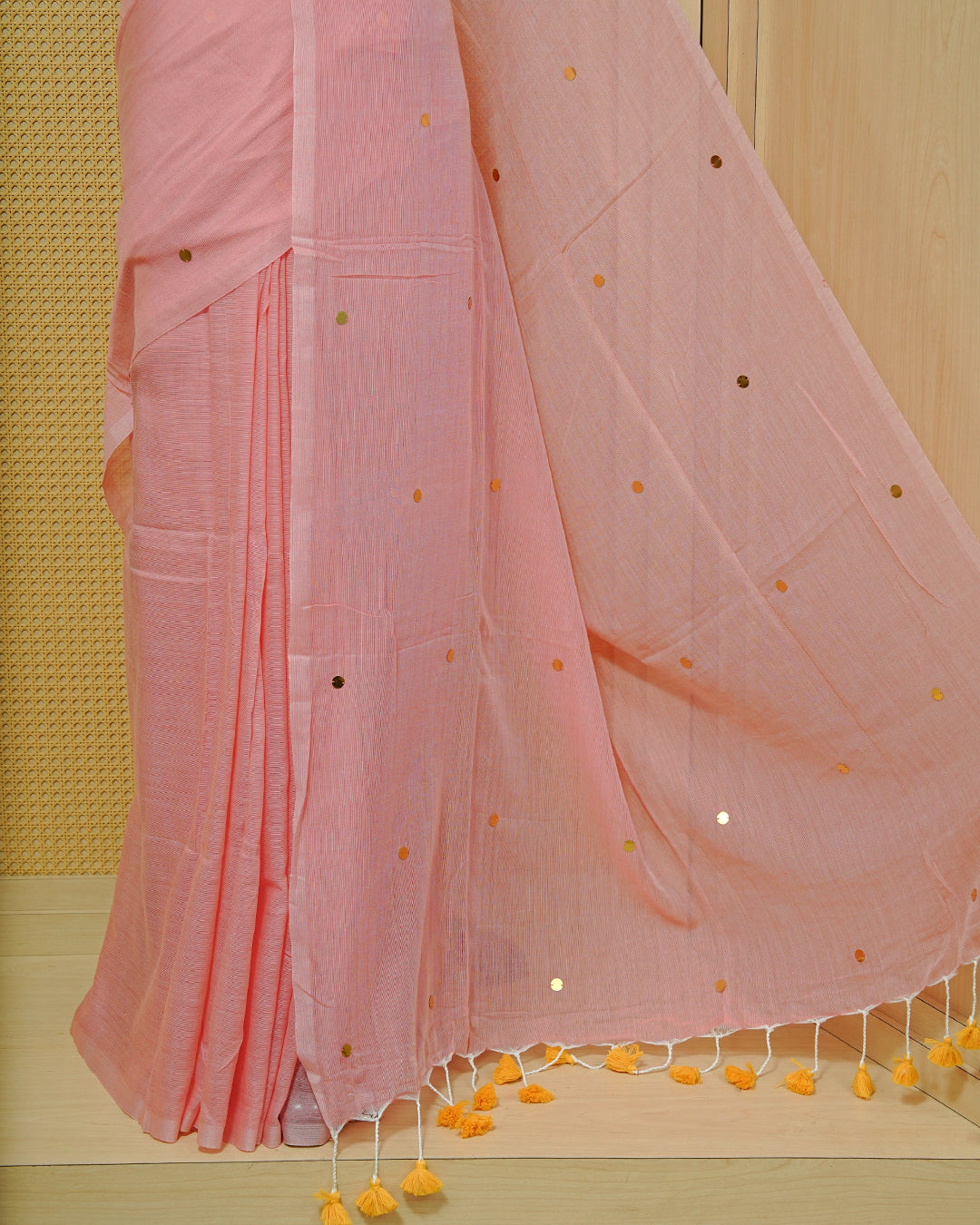 Pink Colour Mul Cotton Saree Featuring Sequins on the Body, Borderless Pattern & Yellow Tassels.
