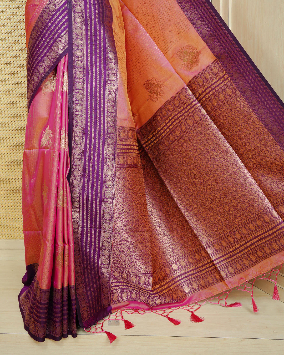 Golden Mustard Mulberry silk saree featuring gold floral zari patterns on body , paired with contrast purple colour with traditional border, comes with matching blouse piece.