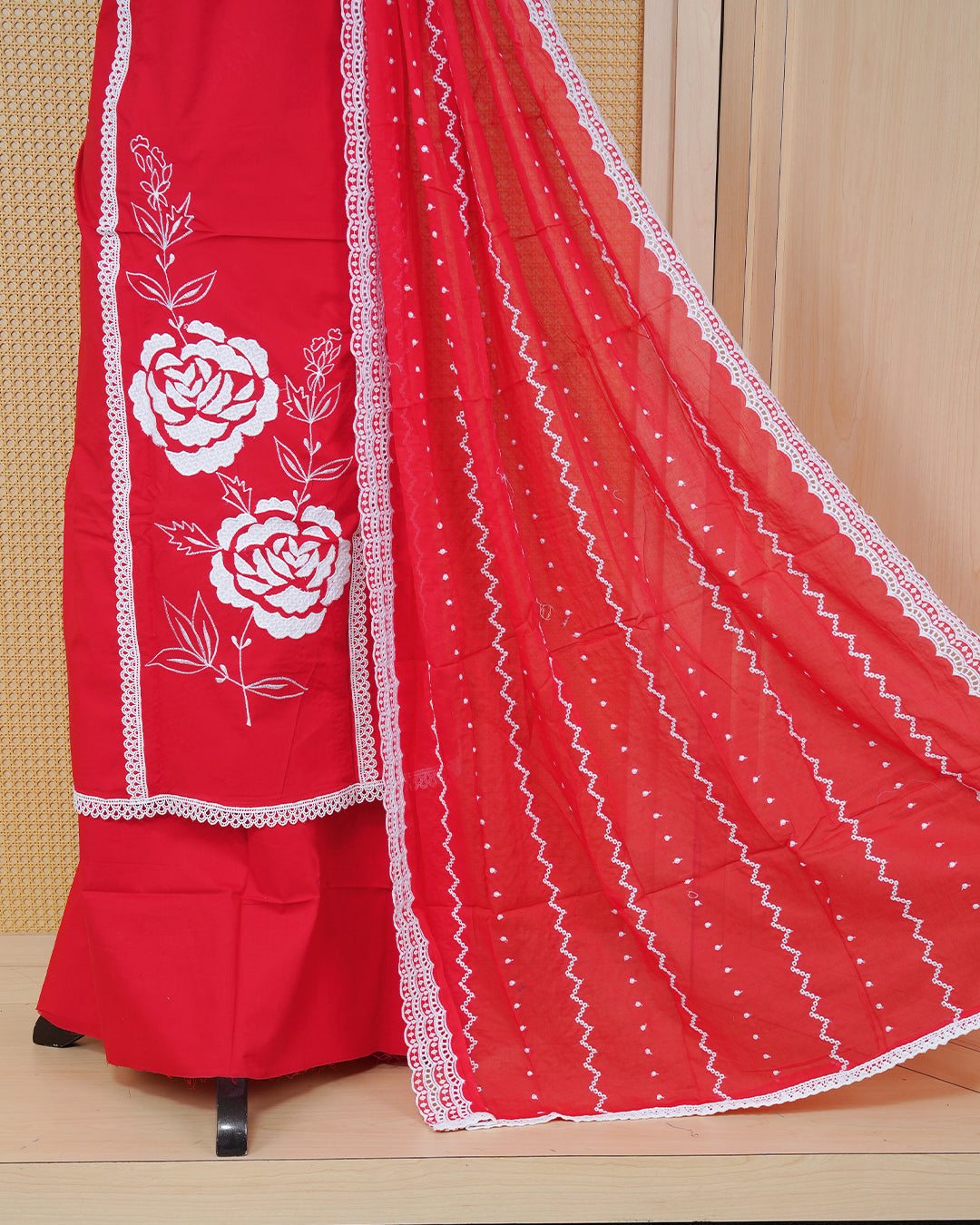 Red colour Cotton Salwar Material Featuring an Threadwork on Body, lace work on neck portion, Paired With a Matching Bottom and an Elegant Dupatta.