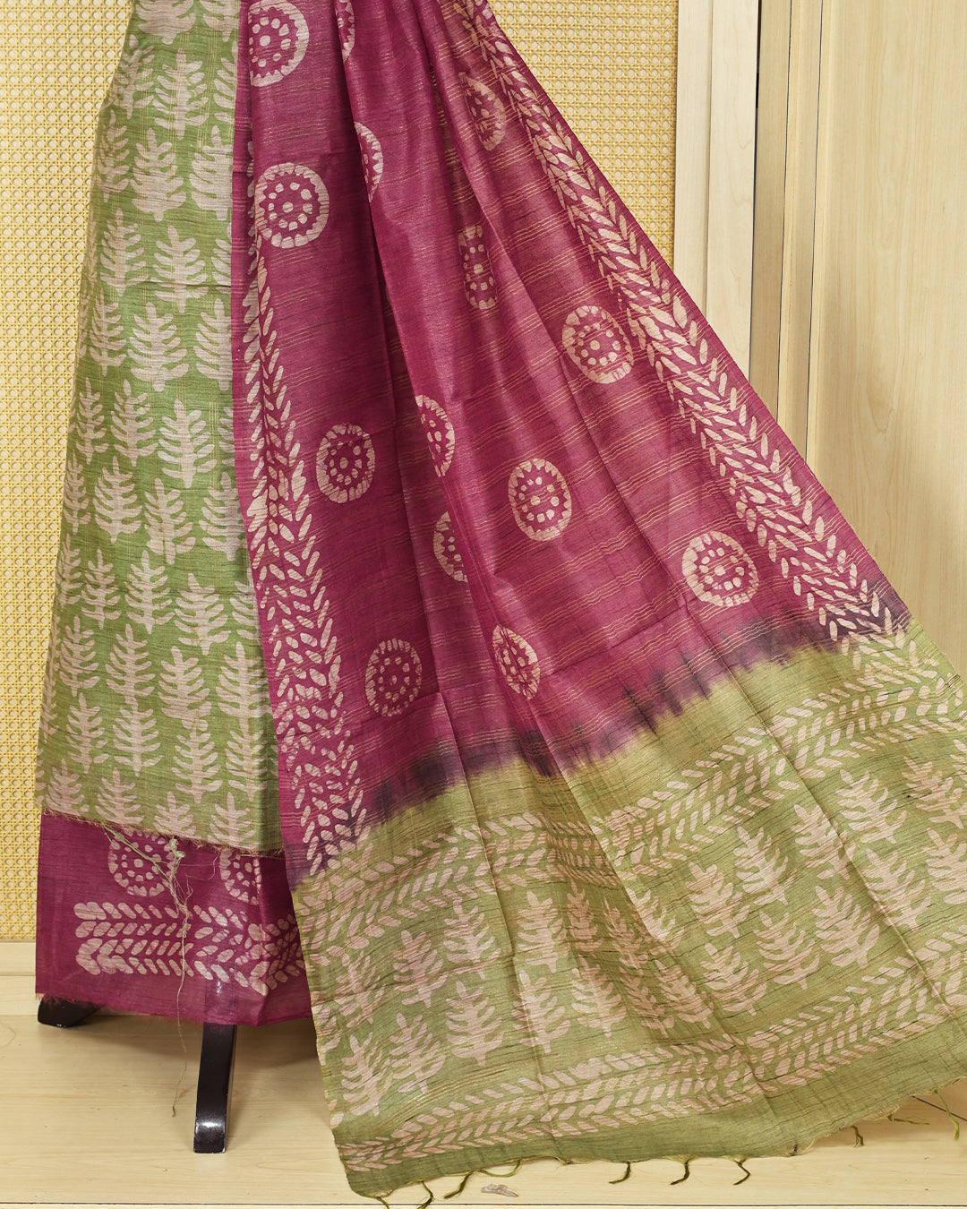Green colour chanderi Salwar Material featuring leaf prints on the kurta, paired with a contrasting plum purple bottom and a matching printed dupatta.