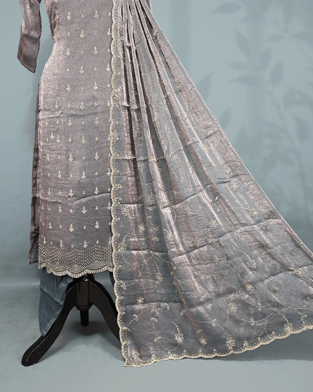Grey colour salwar set with Stone work on top, paired with matching bottom & Dupatta.