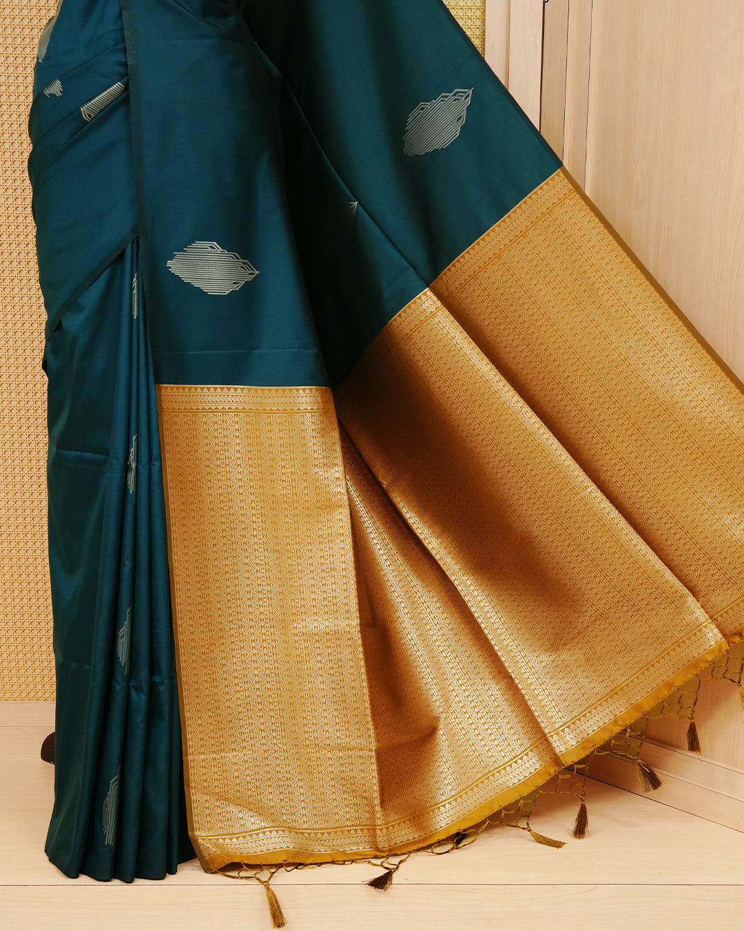 Dark Teal colour semi silk saree.
