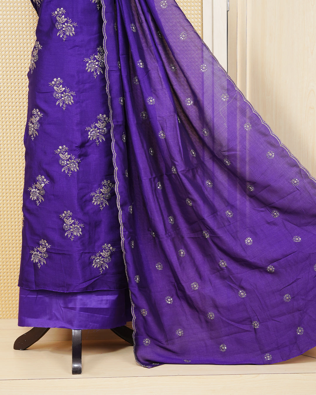 Royal Violet Georgette Salwar Matierial Features an Elegant Floral Embroidery Pattern Aborned With Shimmering Metalic Gold Thread and Sequin Accents, pired with matching bottom & elegant Duptta