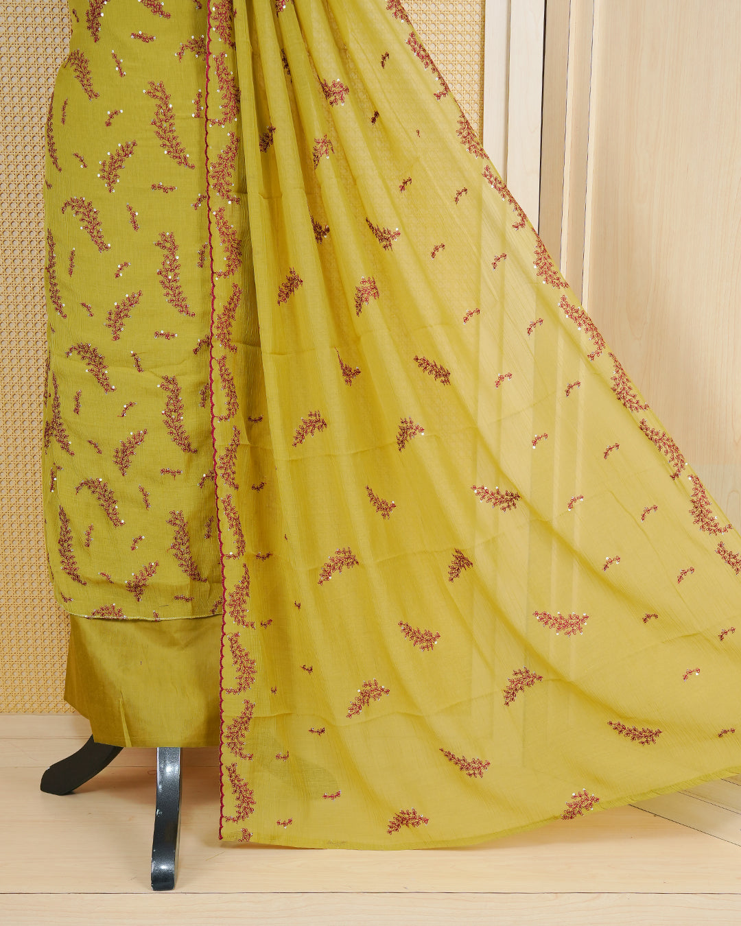 Lanzones colour Salwar material Featuring Thread and Mirorr Work on body, paired with matching bottom and Elagent dupatta.