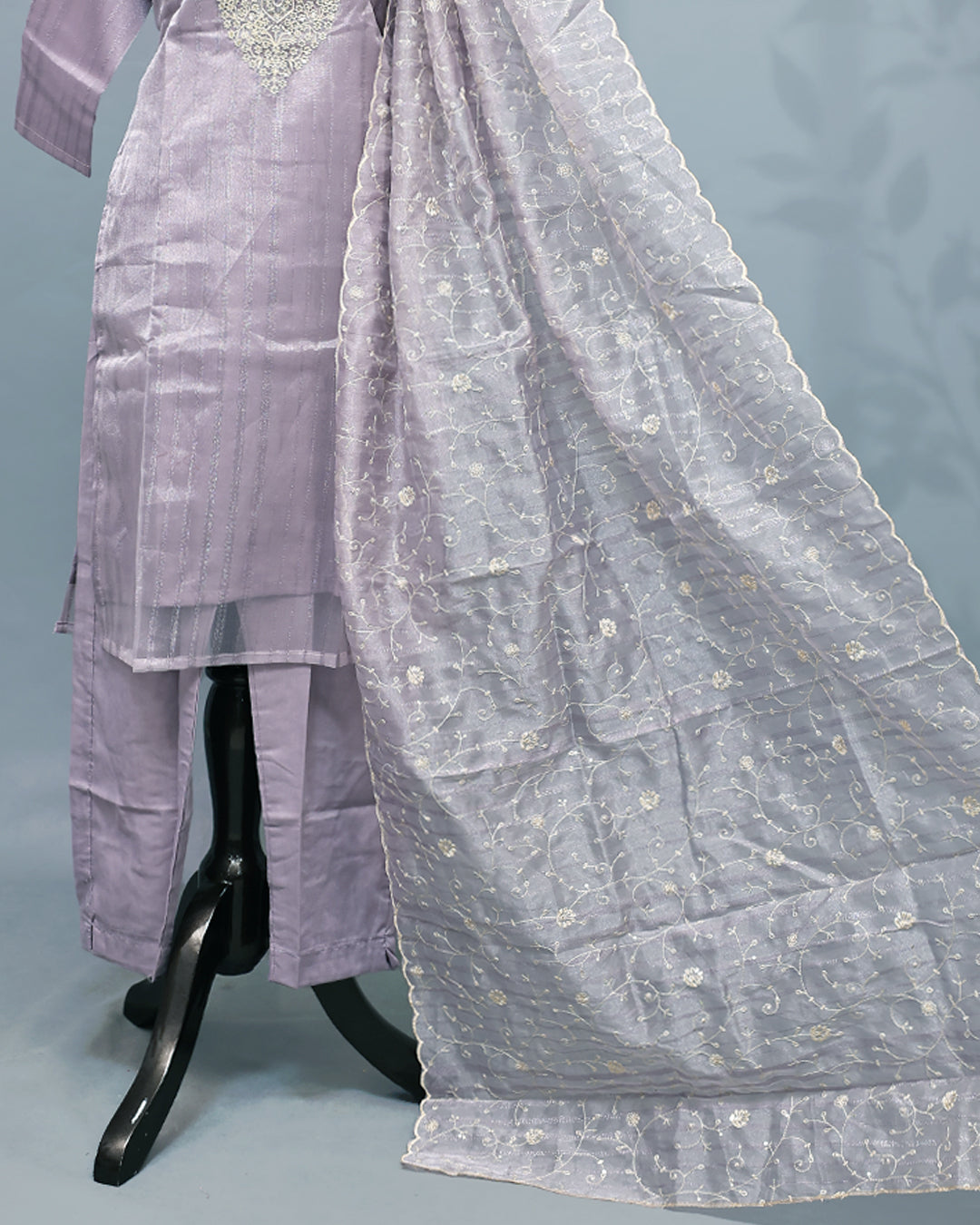 Lavender colour salwar set with Sequins & thread work on top, paired with matching bottom & Dupatta.