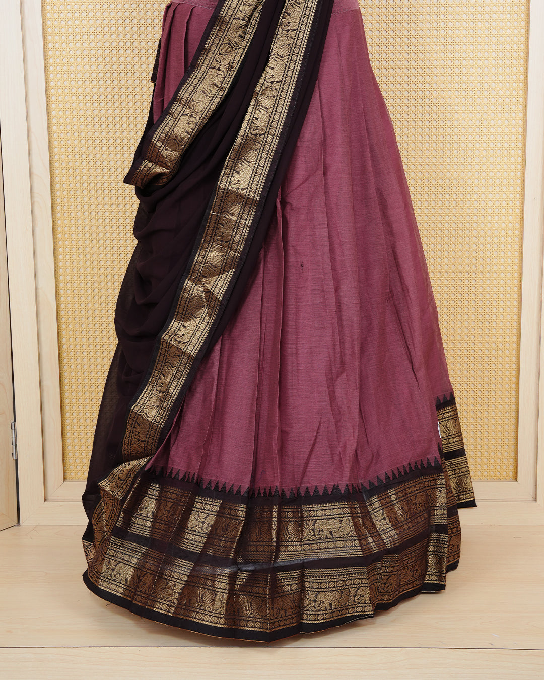 Dark Mauve Brown colour Chettinad Semi Stitched dhavani set Featuring contrast Dark Brown with Gold zari border on skirt, Contrast Blouse piece & matching dupatta.