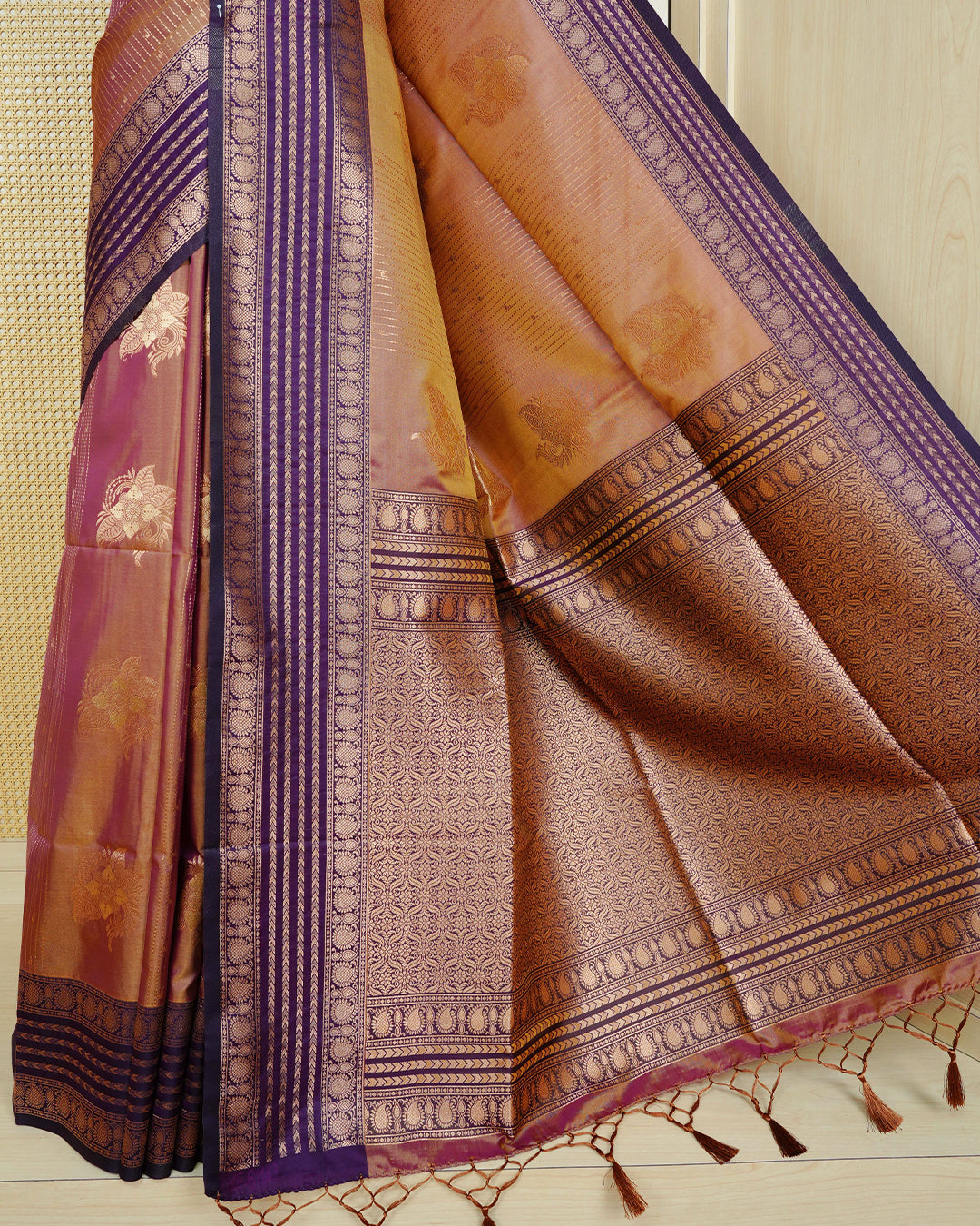 Sandal & gold double shade Mulberry silk saree featuring gold floral zari patterns on body , paired with contrast deep purple colour with traditional border, comes with matching blouse piece.