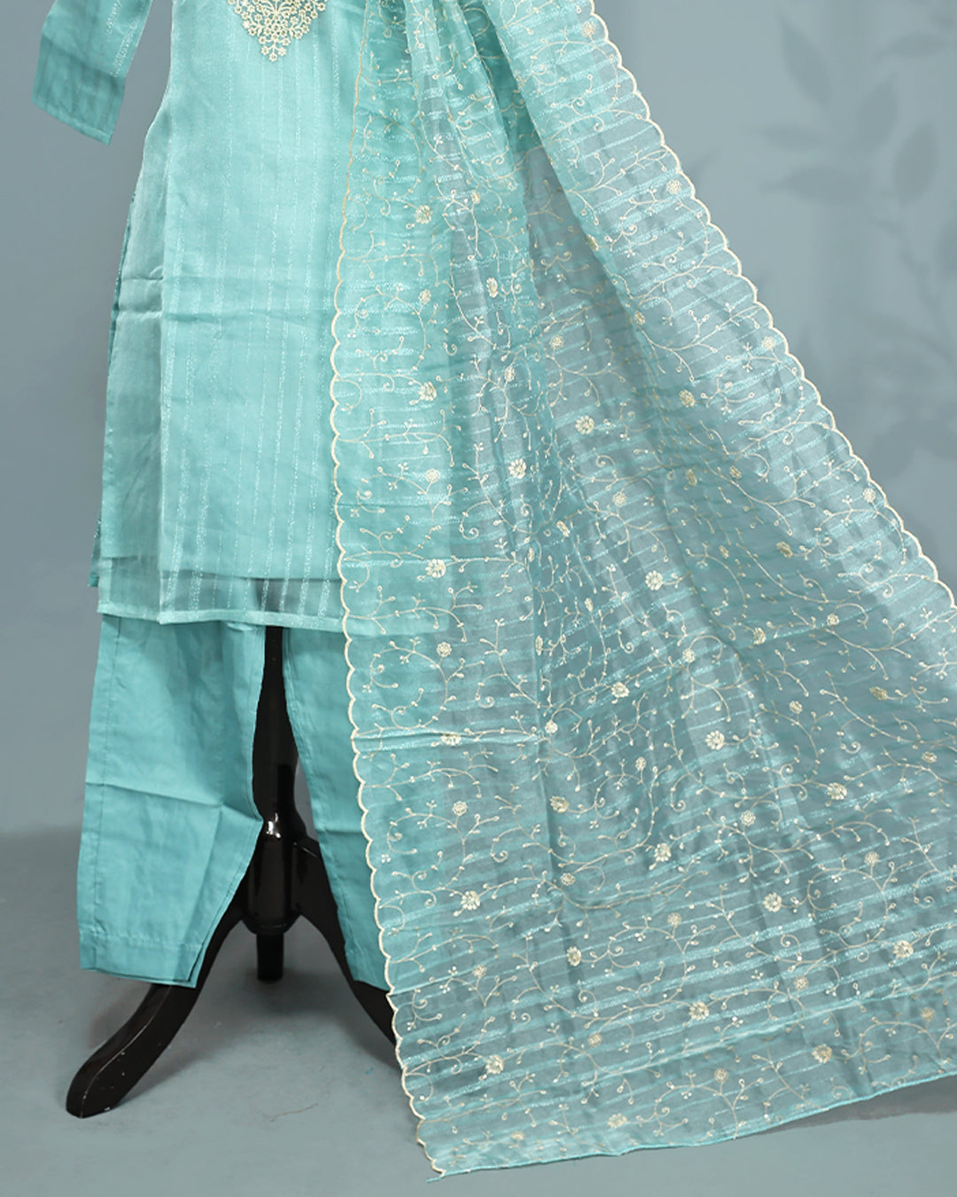 Mint colour salwar set with Sequins & thread work on top, paired with matching bottom & Dupatta.