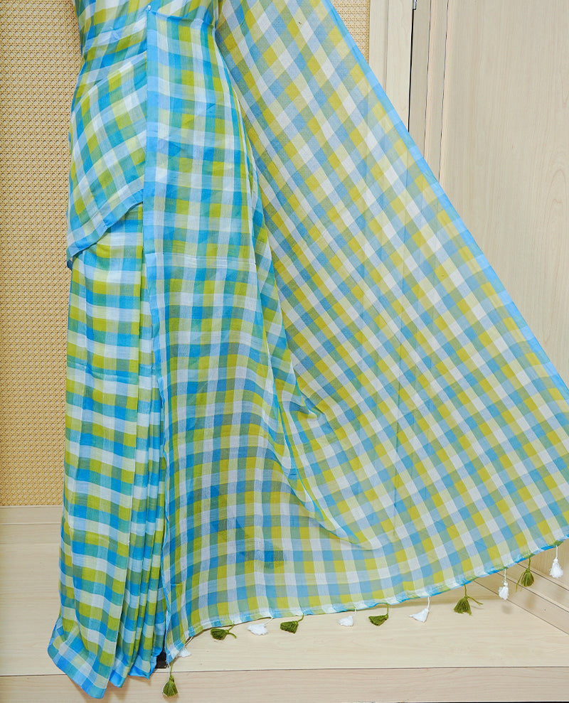 Green, Blue & white Mul cotton saree featuring Small Check pattern across body, complemented by Elegant Tassels.
