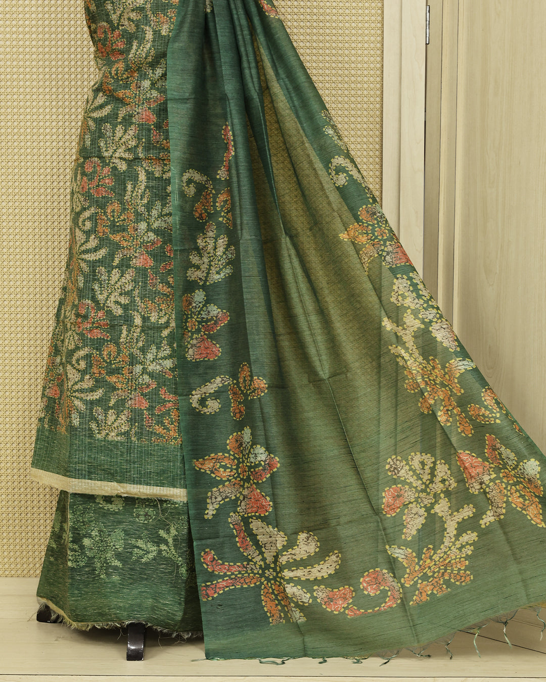 Dark Green colour organza Salwar Material featuring with floral printed kurta, matching bottom, and floral border dupatta.