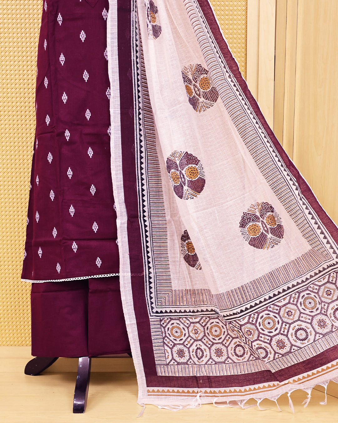 Wine colour Cotton salwar material featuring Thread with mirror work on body, paired with matching bottom & dupatta.