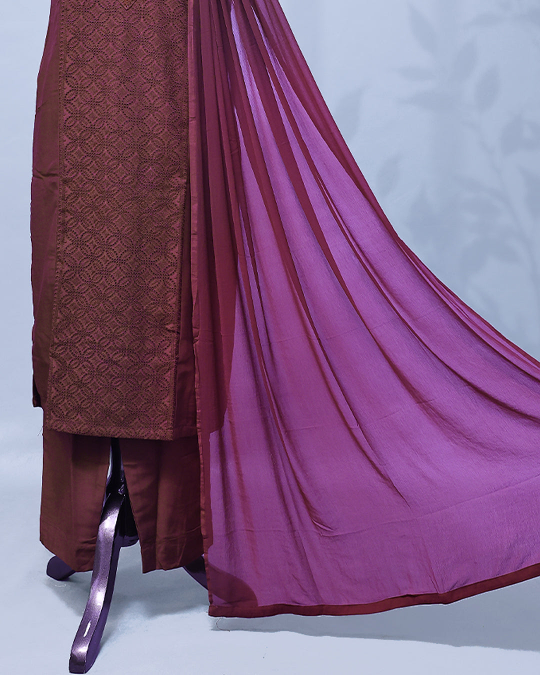 Wine colour Salwar set comes top with thread work on body, paired with matching bottom and dupatta.