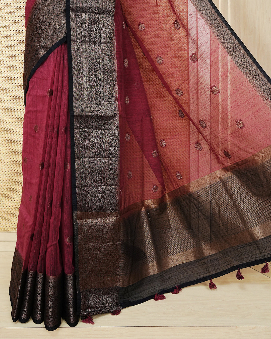 Maroon colour semi linen saree thread motifs on body, contrast dark colour gold zari border, rich pallu comes with matching blouse piece