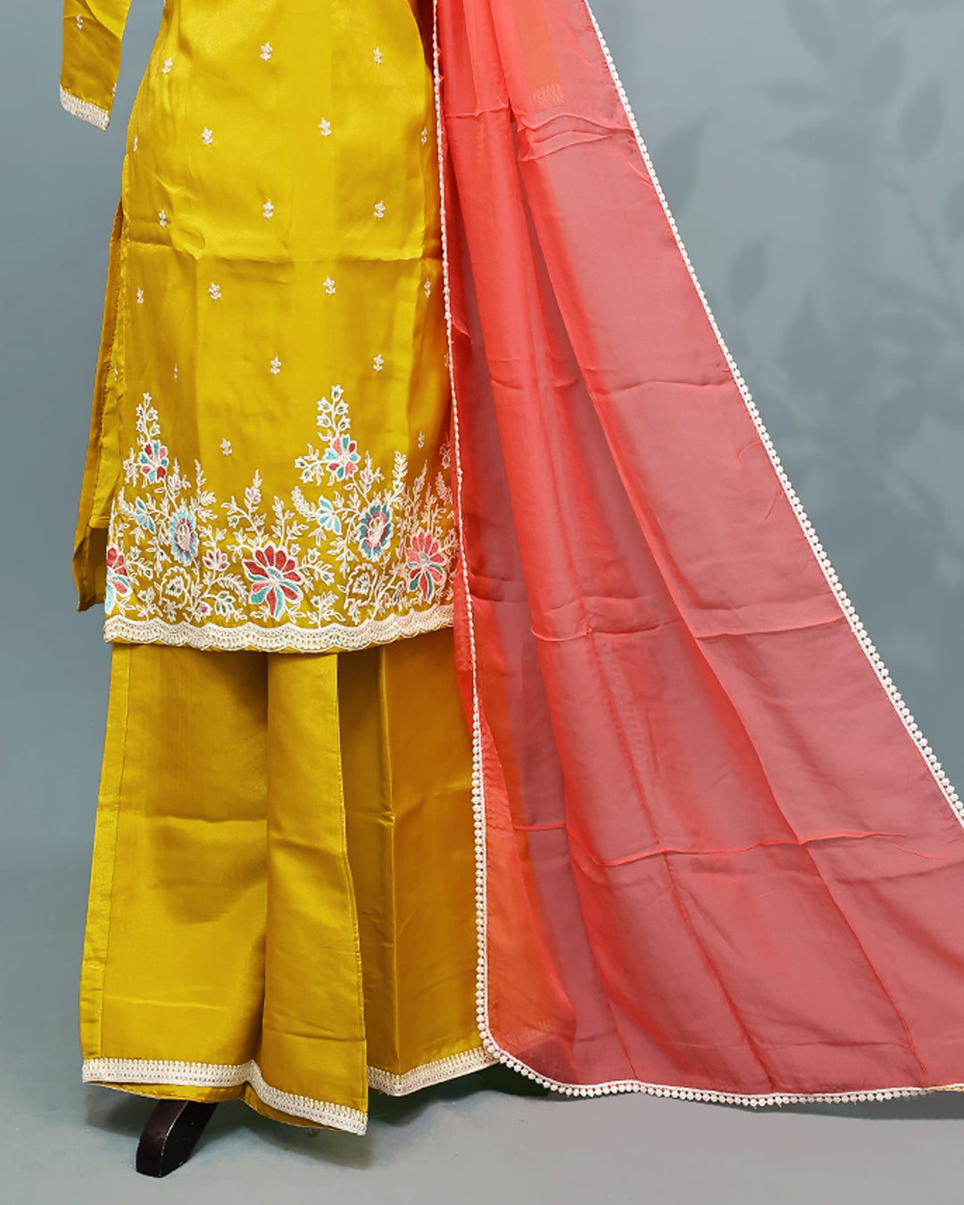 Yellow colour Salwar set comes top with Thread & Sequins work on body, paired with matching bottom and contrast dupatta.
