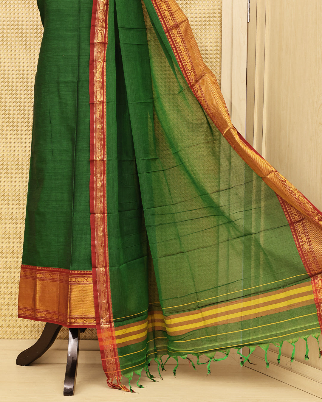 Green colour chettinad Salwar Material with rich contrast zari borders and a matching dupatta, perfect for festive and traditional wear.