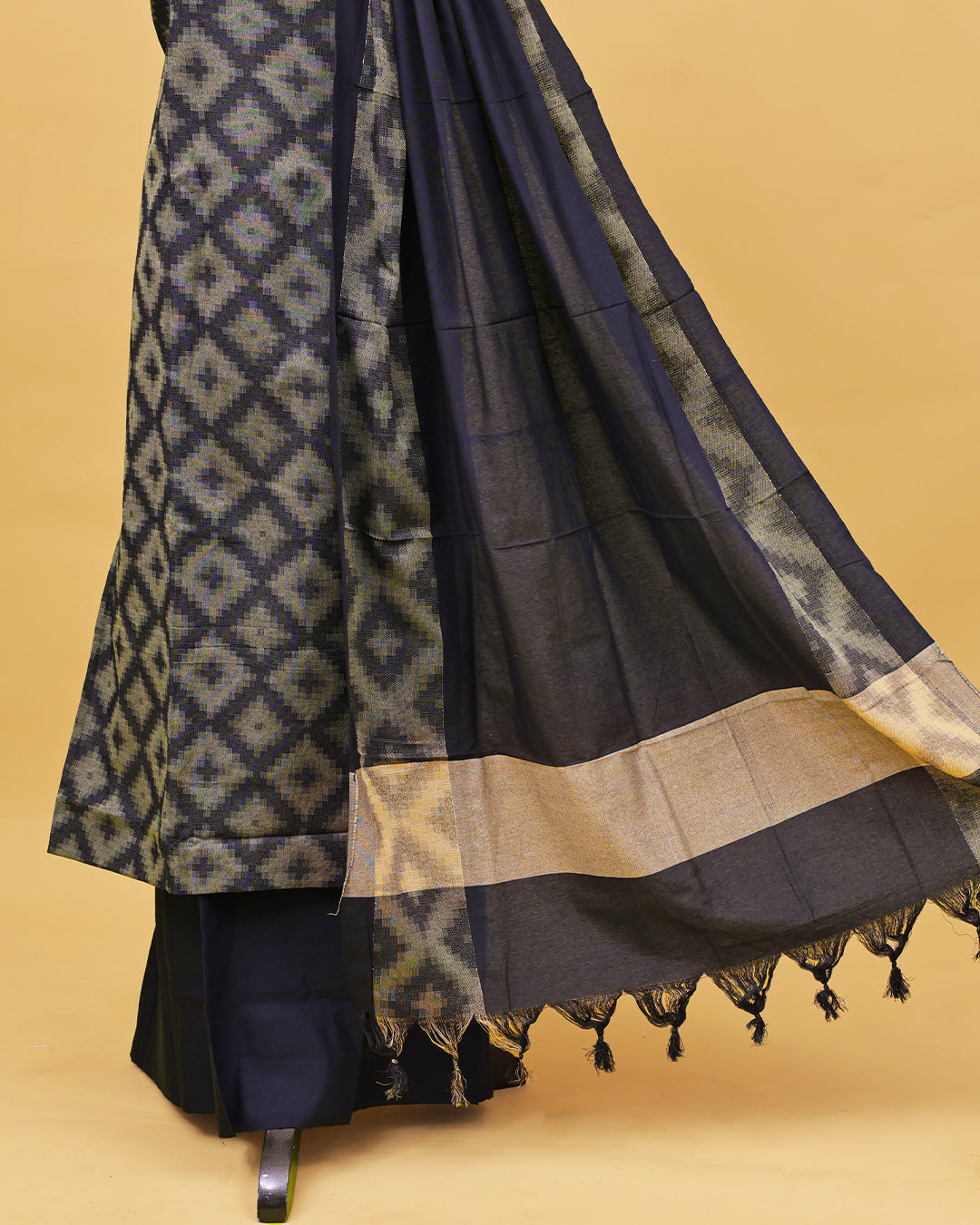 Black colour Net cotton Salwar material with Geometric pattern work on body, matching bottom & Dupatta.