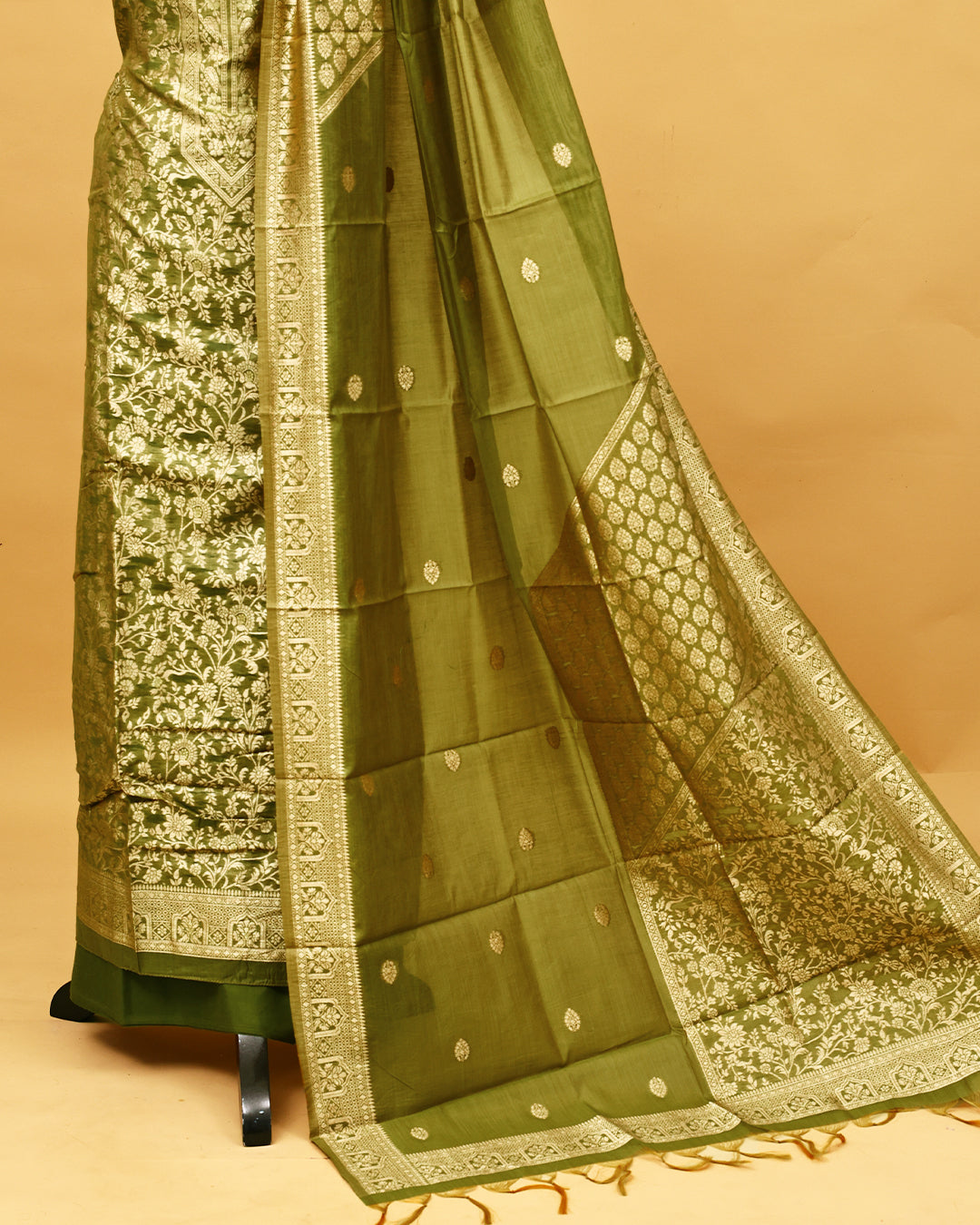 Olive colour Banaras Salwar material with gold zari floral kodi pattern work on body, matching bottom & Dupatta.