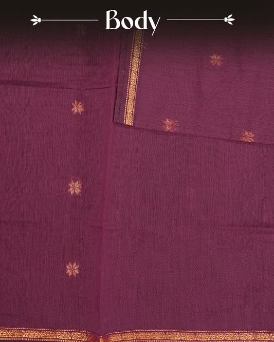 Magenta colour kalyani cotton saree featuring gold zari Floral pattern on body, complemented by  Black colour with Stripes & Floral Gold zari border, paired with matching blouse piece