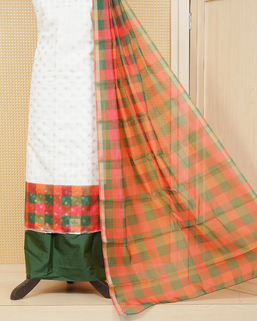 White & Dark Green Chanderi salwar material featuring Gold zari Small motifs on body and Check pattern body, paired with matching colour santoon bottom, elegant dupatta.