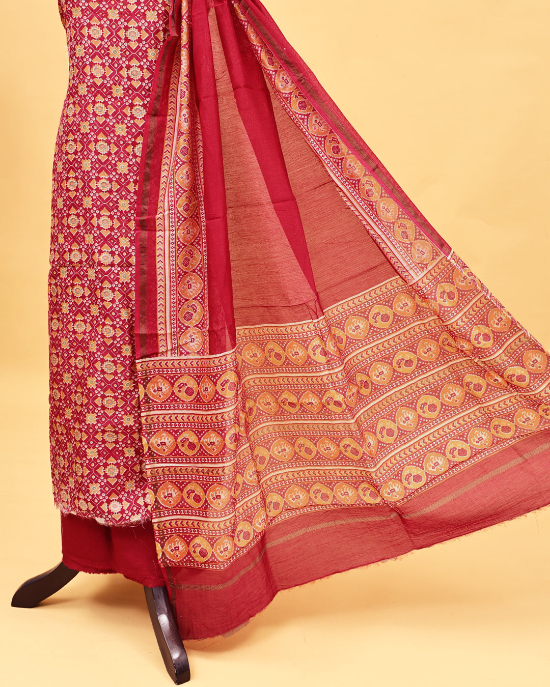 Red colour Salwar material with Geometric pattern print on body, matching bottom & Dupatta.