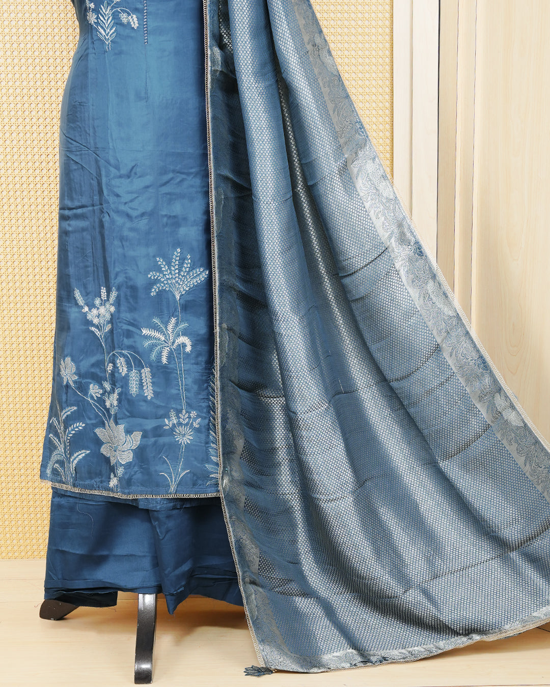 Steel Blue Silk Salwar Material Features an Elegent Floral Embroidary Pattern Aborned With Shimmering Metallic Gold Thread and Lace Border Work, paired with matching bottom & elegant Duptta