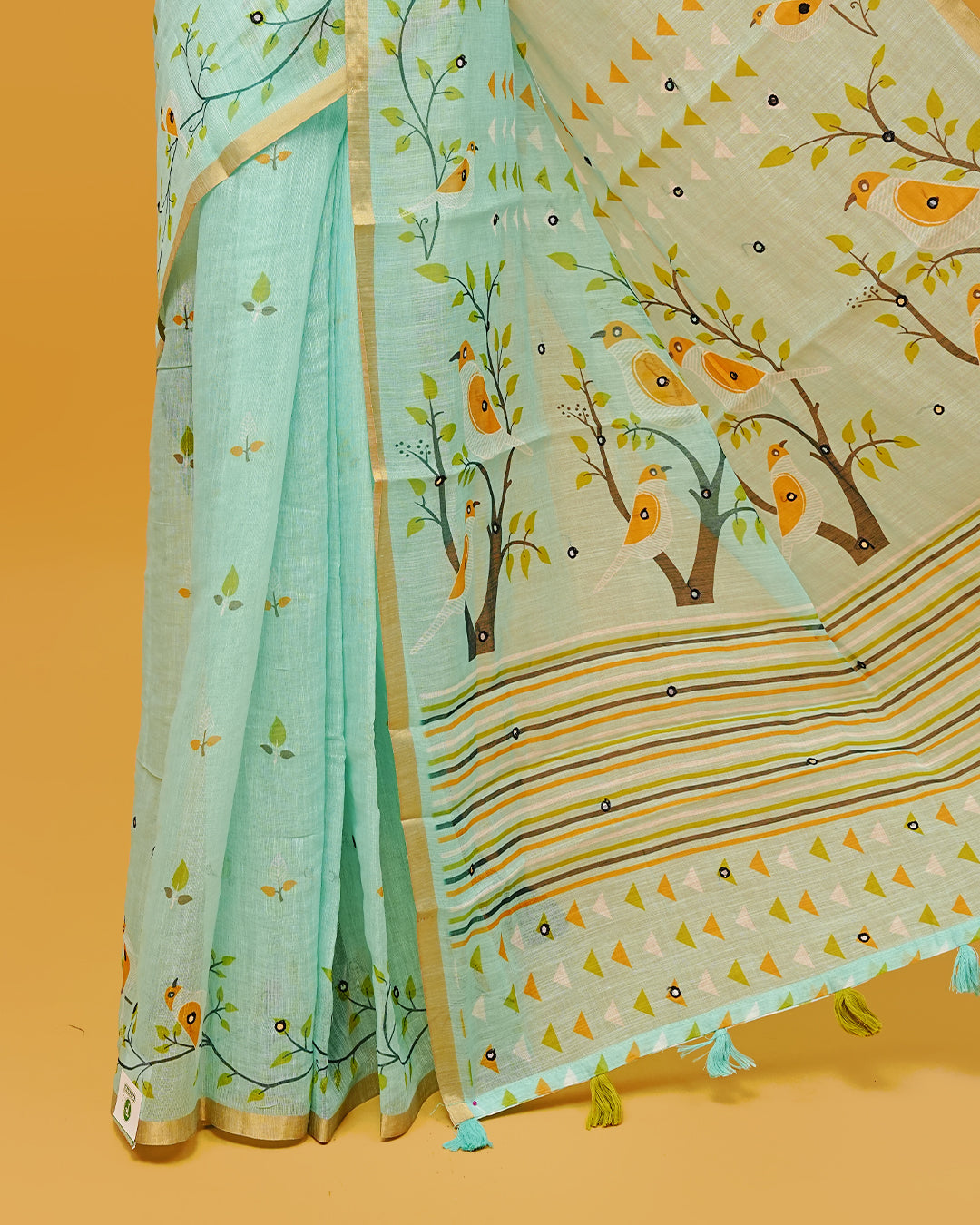 Light Aqua Colour Semi Linen Saree featuring birds print with mirror work, paired with matching printed blouse piece.
