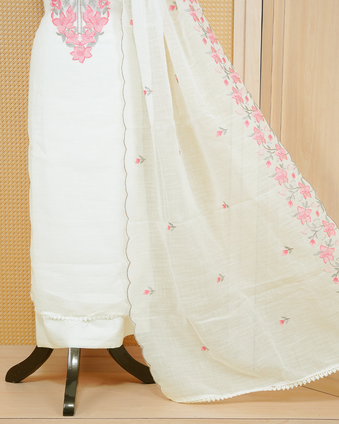 White Georgette Salwar Matierial Features an Elegant Floral Embroidary Pattern Aborned With Pink and Gray Thread Work, Pired with matching bottom & elegant Duptta