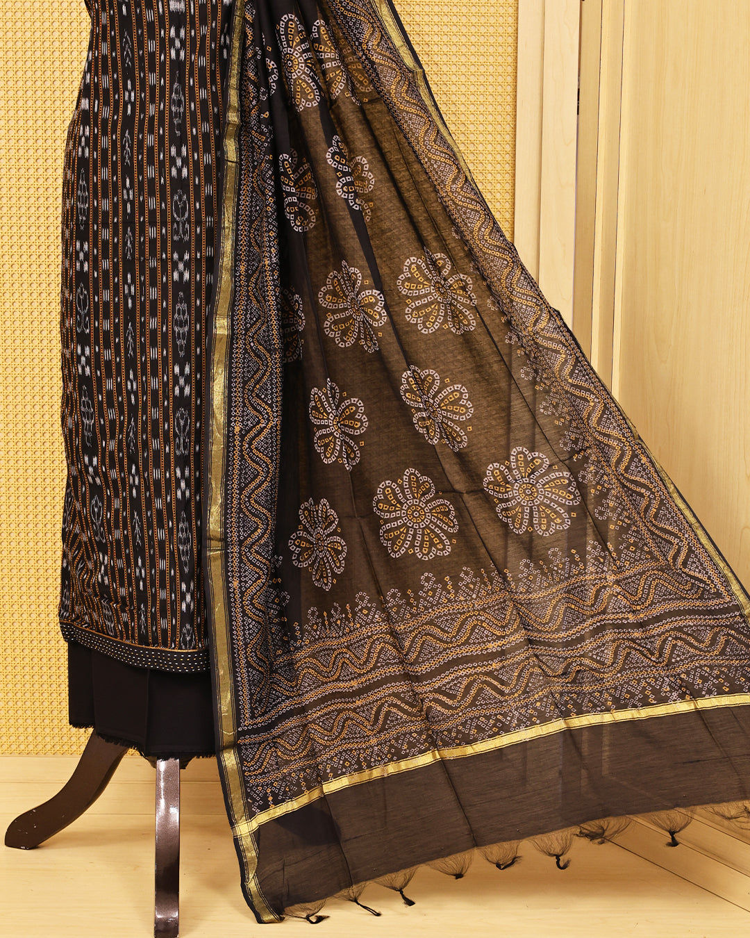 Black colour Cotton Salwar material Designed strips on body, paired with matching bottom & Dupatta.