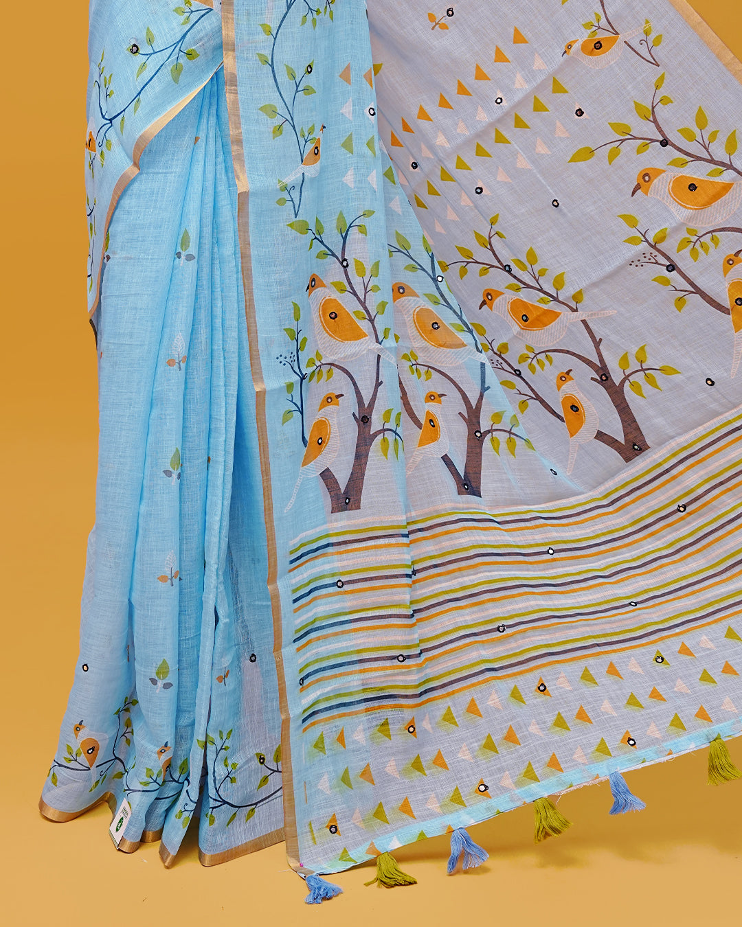 Light Blue Colour Semi Linen Saree featuring birds print with mirror work, paired with matching printed blouse piece.