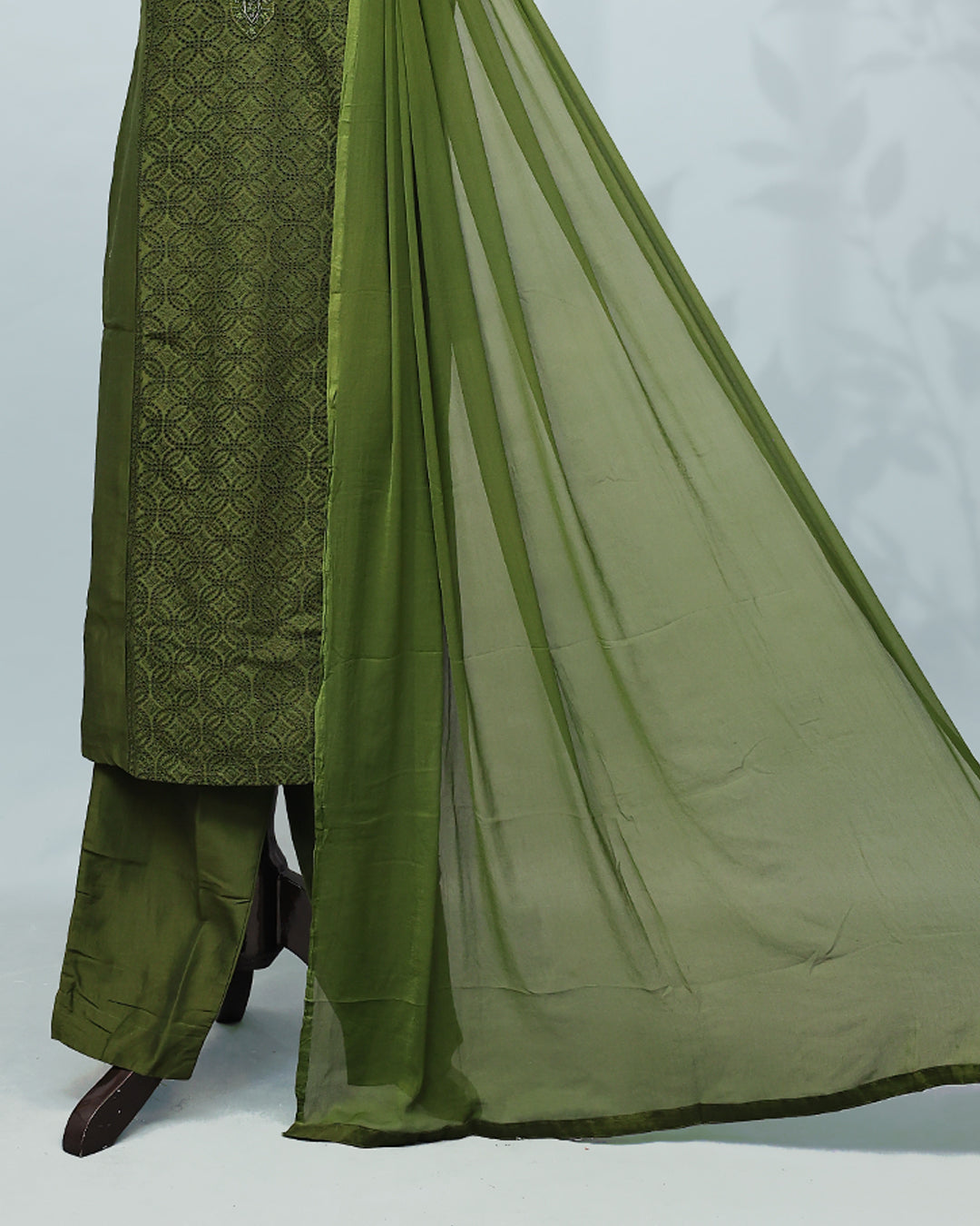 Olive Green colour Salwar set comes top with Self colour thread worked body, paired with matching bottom and dupatta.