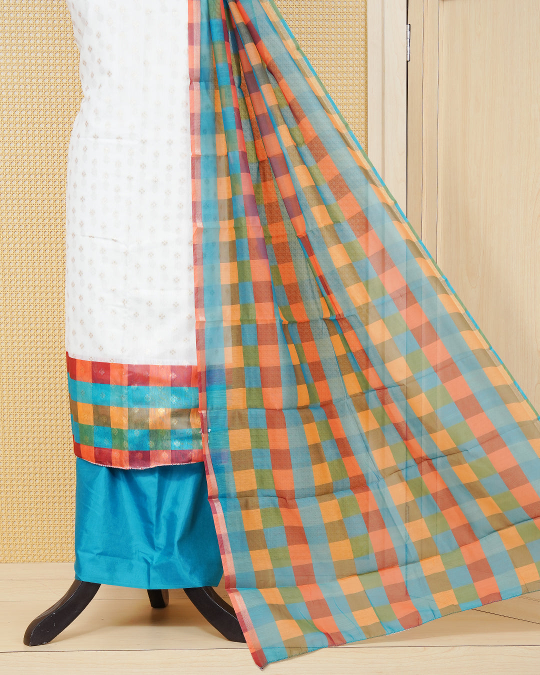 White & Teal Chanderi salwar material featuring Gold zari Small motifs on body and Check pattern body, paired with matching colour santoon bottom, elegant dupatta.
